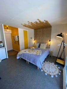 Кровать или кровати в номере Studio Beach House à Sangatte bord de plage