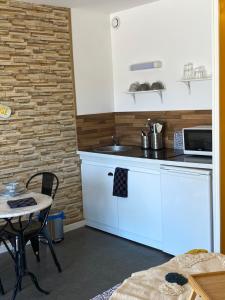 Кухня или мини-кухня в Studio Beach House à Sangatte bord de plage
 +13 фотографий