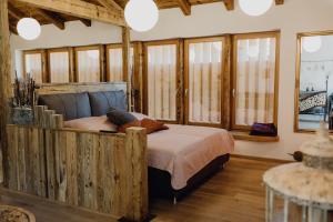 A bed or beds in a room at Exklusives Loft "Auszeit für2"
