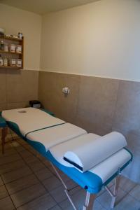 a hospital room with two beds in it at Toldi Fogadó in Tokaj