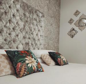 Postel nebo postele na pokoji v ubytování B&B Cà del Poeta