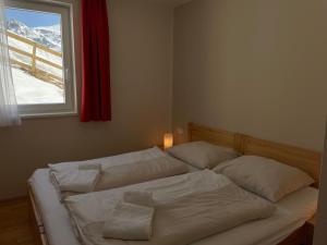 Voodi või voodid majutusasutuse Obertauern Alps toas