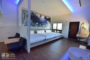 Postel nebo postele na pokoji v ubytování Sunny Ocean B&B