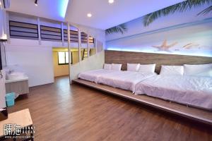 Postel nebo postele na pokoji v ubytování Sunny Ocean B&B