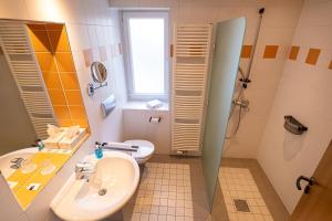Koupelna v ubytování Hotel Am Froschbächel