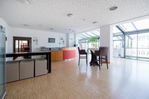 Kuchyň nebo kuchyňský kout v ubytování Hotel Am Froschbächel