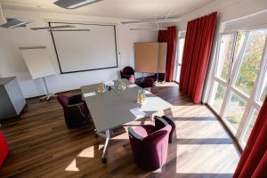 Posezení v ubytování Hotel Am Froschbächel
