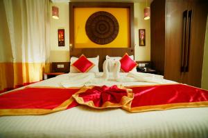 Katil atau katil-katil dalam bilik di Vivin Luxury Suites