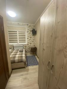 Postel nebo postele na pokoji v ubytování Вігвам