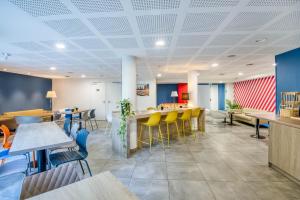 Restaurant o un lloc per menjar a Aparthotel Adagio Access Saint Nazaire