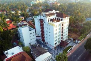an overhead view of a building in a city at Vivin Luxury Suites in Trivandrum