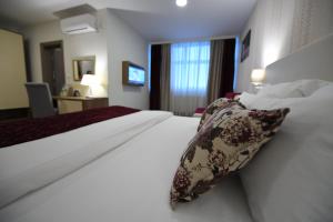 Hotel Kole 객실 침대