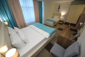 Hotel Kole 객실 침대