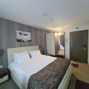 Hotel Kole 객실 침대