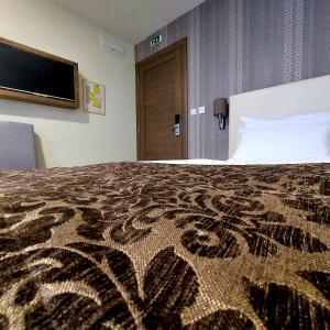 Hotel Kole 객실 침대