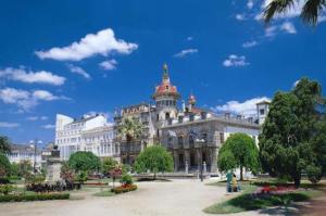 a large building with a tower on top of it at Hotel Mediante in Ribadeo