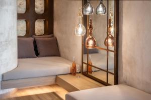Posteľ alebo postele v izbe v ubytovaní Inotropes Boutique Suites - Adults Only