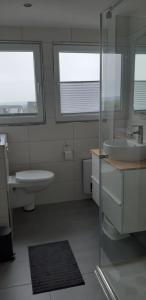 Koupelna v ubytování Ferienwohnung Harzer Wolf in Goslar/Sudmerberg