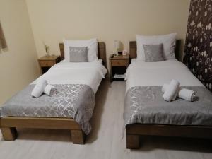 Postel nebo postele na pokoji v ubytování Apartmani CENTAR- Smederevo