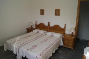 Posteľ alebo postele v izbe v ubytovaní Apartamentos La Dorada
