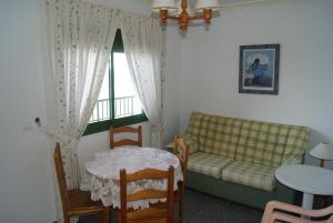 Posedenie v ubytovaní Apartamentos La Dorada