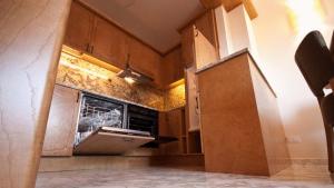 Kuchyň nebo kuchyňský kout v ubytování Antella Residence