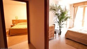 Postel nebo postele na pokoji v ubytování Antella Residence