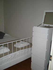A bed or beds in a room at Konakli Apartments Izmir