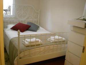 A bed or beds in a room at Konakli Apartments Izmir