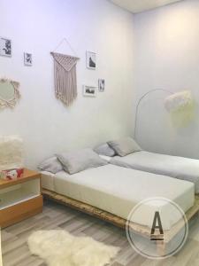 En eller flere senge i et værelse på 一间民宿 A Homestay