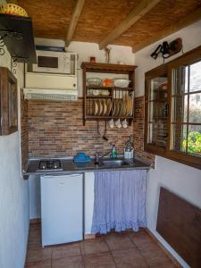 A kitchen or kitchenette at CR La Bohemia