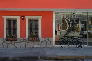 a bike parked in front of a store at Hotel Santa Cruz in Chihuahua