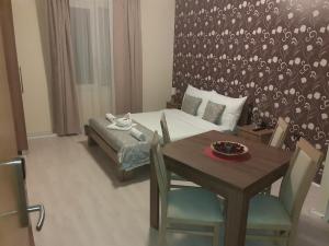 Postel nebo postele na pokoji v ubytování Apartmani CENTAR- Smederevo