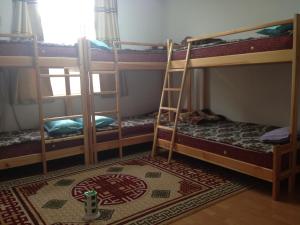 Postel nebo postele na pokoji v ubytování Sunpath Mongolia Tour & Hostel