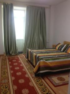 Postel nebo postele na pokoji v ubytování Sunpath Mongolia Tour & Hostel
