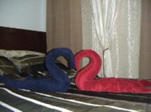 Postel nebo postele na pokoji v ubytování The Oasis Davao Condotel