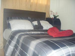 Postel nebo postele na pokoji v ubytování The Oasis Davao Condotel