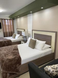 a hotel room with a bed and a desk at Ulala Culebra in Culebra