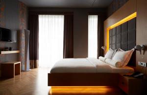 Postel nebo postele na pokoji v ubytování Amadi Park Hotel