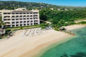 an aerial view of the resort and the beach at Iberostar Grand Rose Hall in Montego Bay