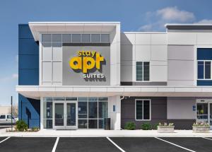 a store front of a shopping center with a sign on it at stayAPT Suites Rock Hill in Rock Hill