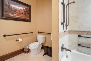 a bathroom with a toilet and a sink at Arrowleaf Lodge - 1 Bed Studio #101A in Park City