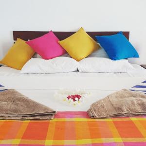 Wellé Wadiya Beach Villa客房内的一张或多张床位