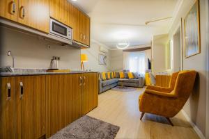 A kitchen or kitchenette at La Palace Exclusive Design