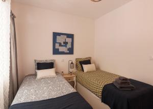 Habitación con 2 camas individuales en Exclusive Luxury Property, en Alicante