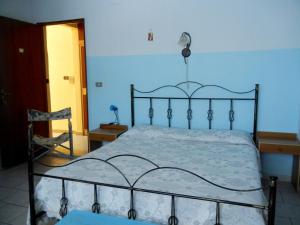 Postel nebo postele na pokoji v ubytování B&B La Pineta