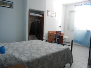 Postel nebo postele na pokoji v ubytování B&B La Pineta