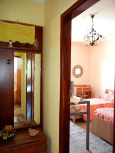 Postel nebo postele na pokoji v ubytování B&B La Pineta