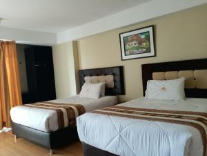 Hotel Mantas Cusco客房内的一张或多张床位