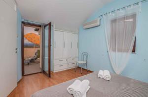 Postel nebo postele na pokoji v ubytování Apartment in Klimno - Insel Krk 41835
